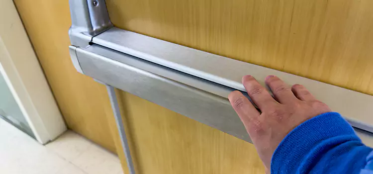 Installing a Push Bar on a Door Poinciana